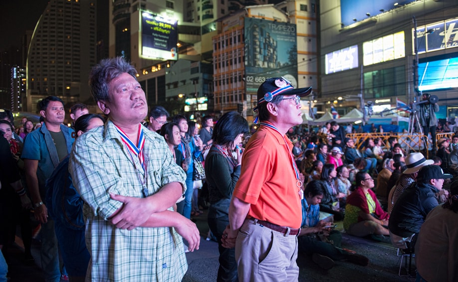 Rede bei der Asoke-Intersection in Bangkok